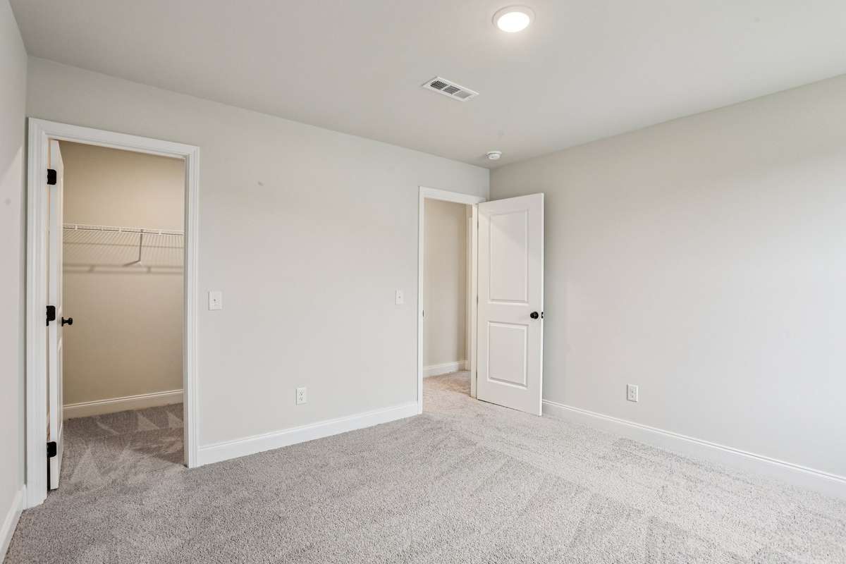 A walk-in closet is also included with Bedroom #2.
