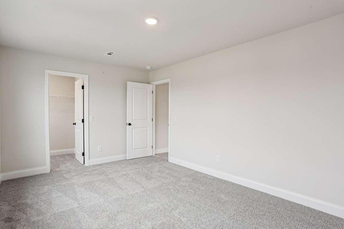 Bedroom #4 measures 16' x 11' and also includes a walk-in closet.