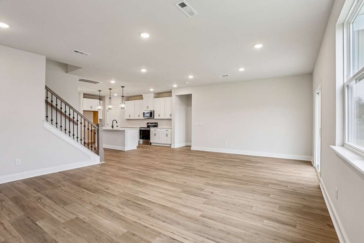 The dining area is located right off of the kitchen and great room and are designed to comfortably fit a 6-8 person table.
