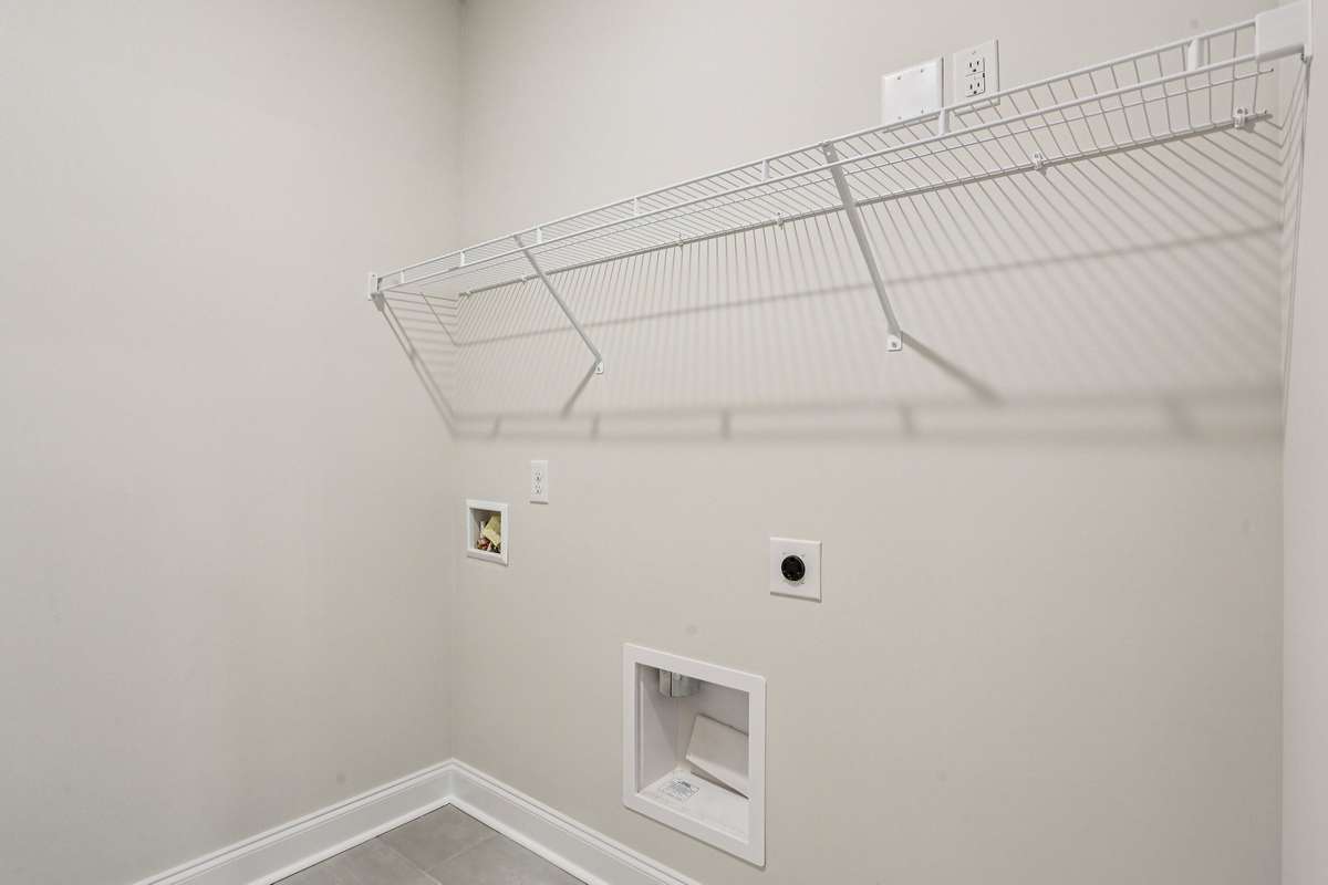 The Laundry Room is located on the 1st floor and includes tile flooring.