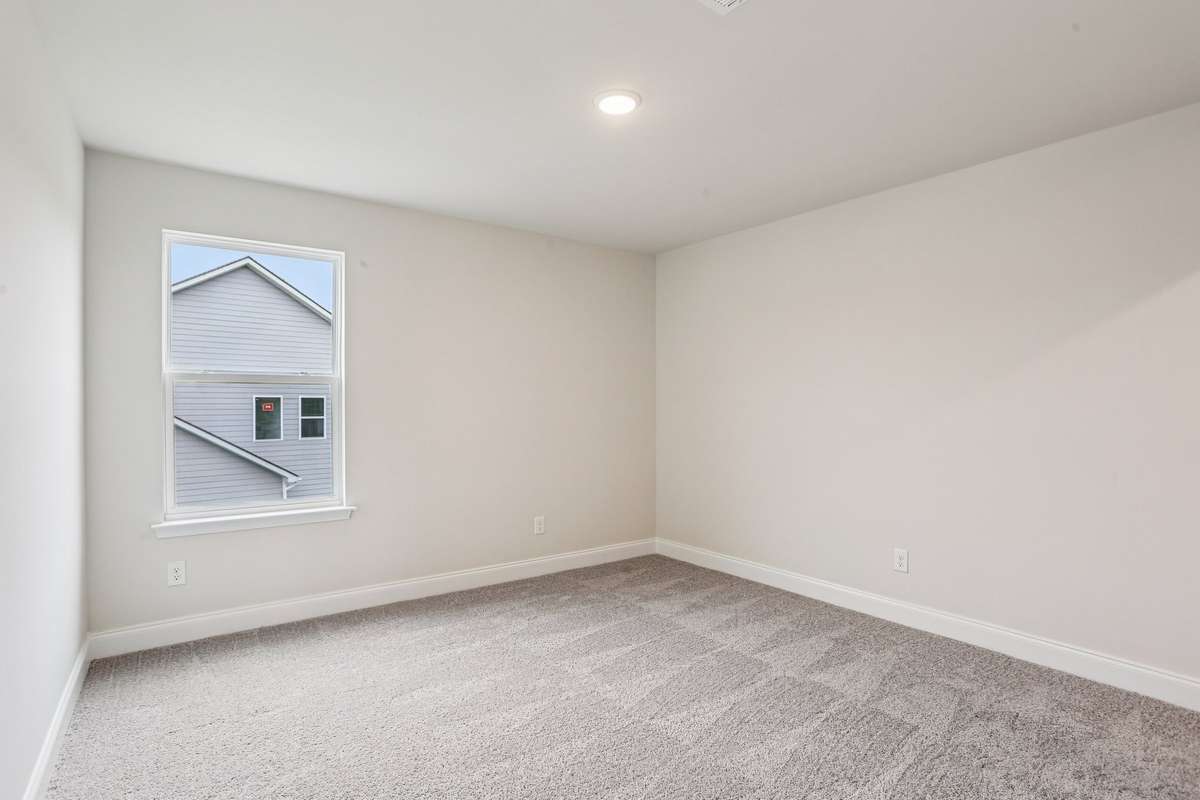 Bedroom #2 is located upstairs and measures approximately 12' x 12'.