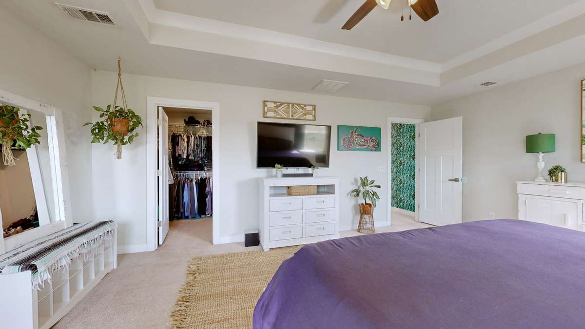 View into the first of two walk in closets