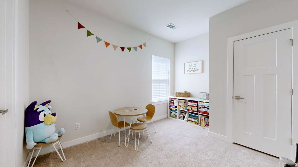 Guest suite on main level, currently used as a playroom