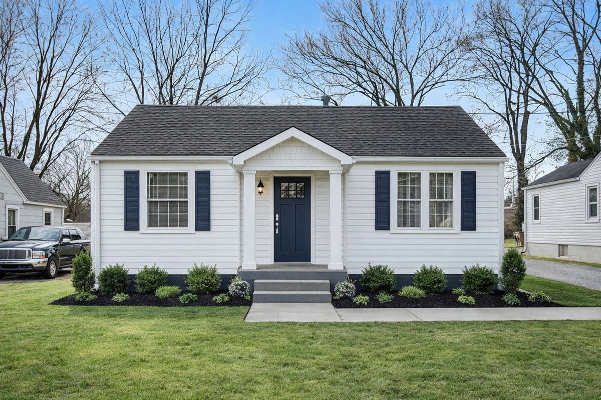 1232 Kenmore Place is ready for an investor to place their own stamp on this home. This AI image helps to reimagine this home with enhanced curb appeal.
