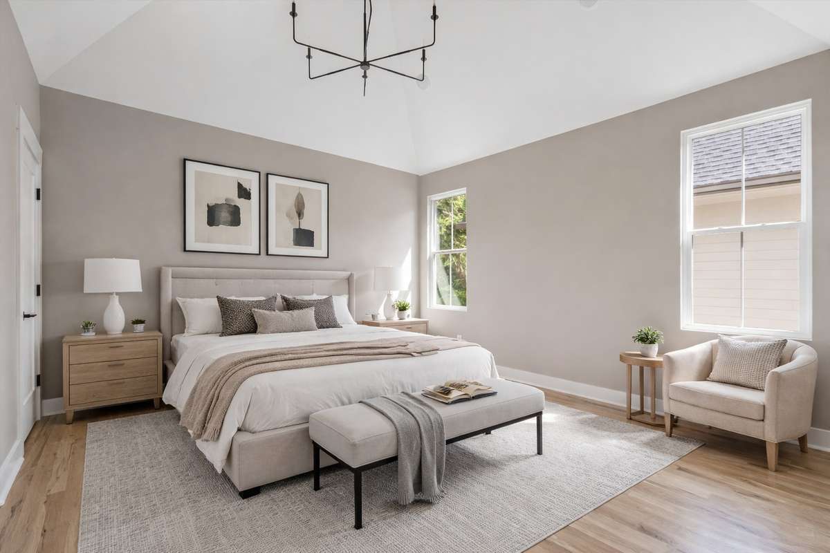 Virtually staged primary bed.