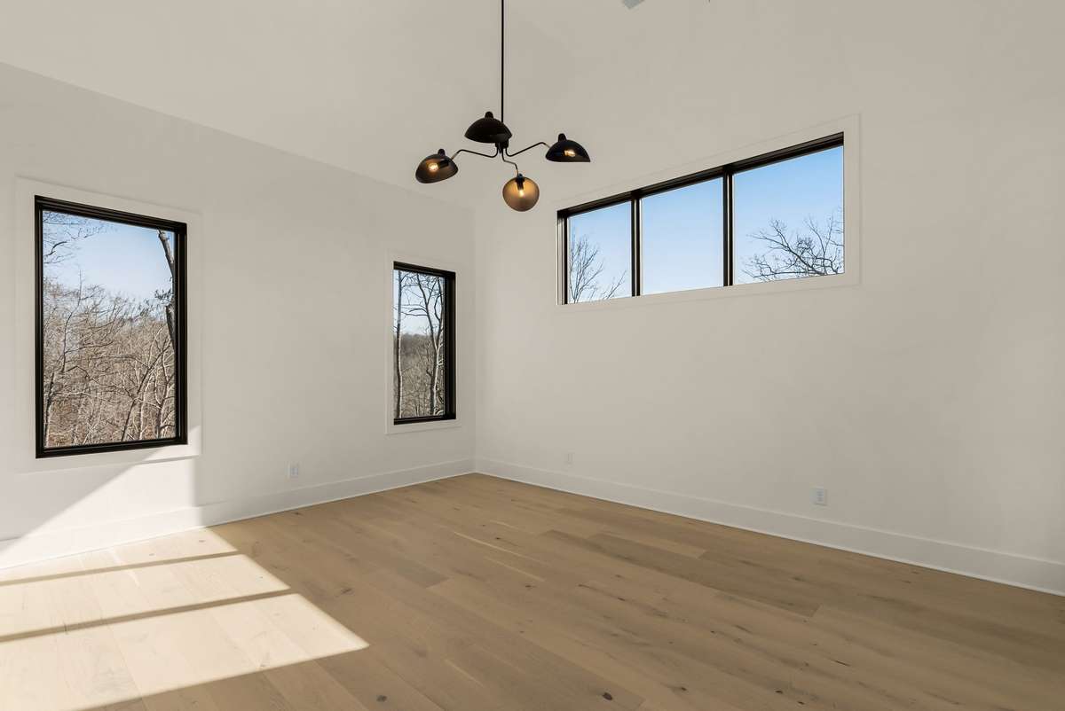 Additional upstairs room offering flexible use as a bedroom, office, or creative space.