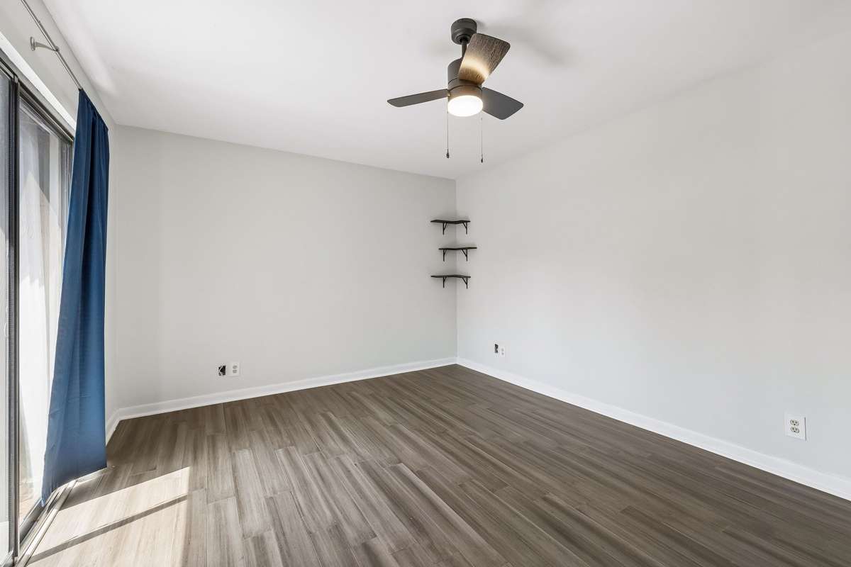 Bedroom two has its own ceiling fan and large sliding doors! 101 Cedarwood Lane, Madison, TN 37115