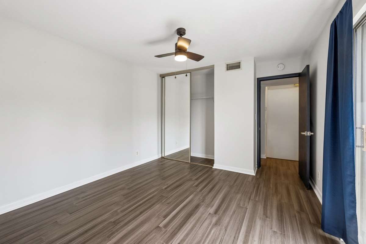 Second bedroom has a spacious closet with mirrored door. 101 Cedarwood Lane, Madison, TN 37115