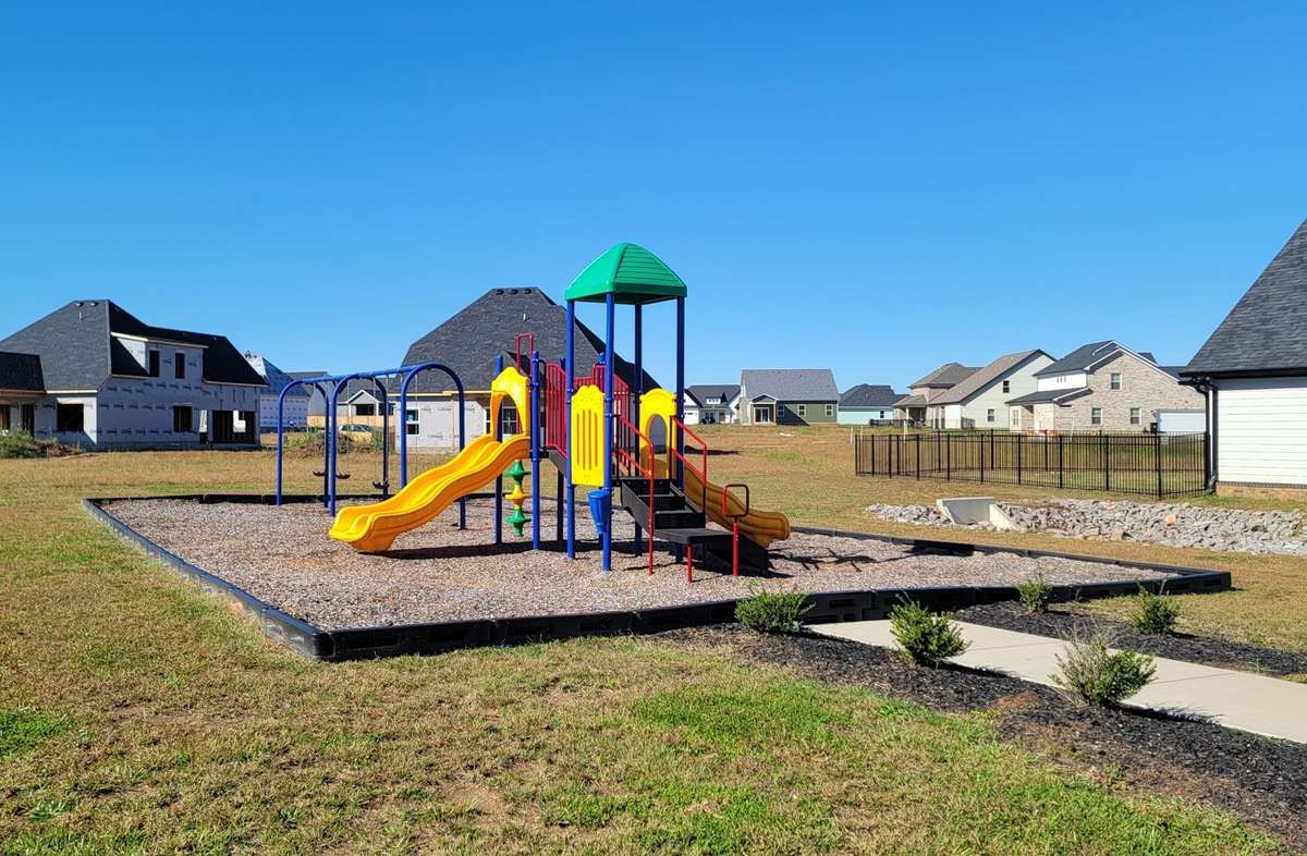 Playground located adjacent to the security mail kiosk