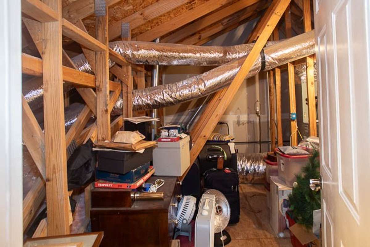 Storage area accessed through upstairs bathroom
