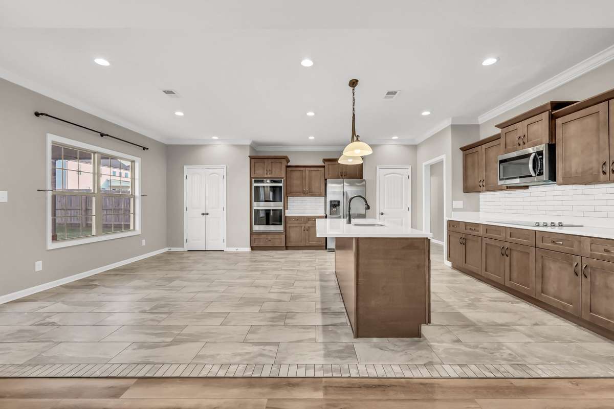 Massive Kitchen Features a Large Island, Smart Double Oven, TWO Pantries & an Eat-In Area!