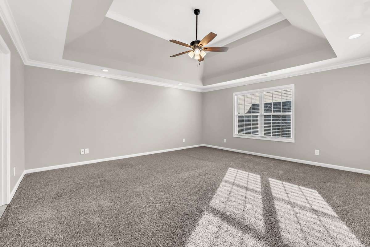 Huge Primary Bedroom w/ a Double Tray Ceiling & TWO Walk-in Closets!