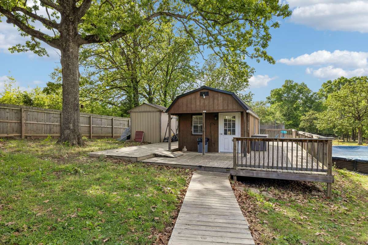 Huge outbuilding with mini-split inside. Perfect for kids or a hobby room!