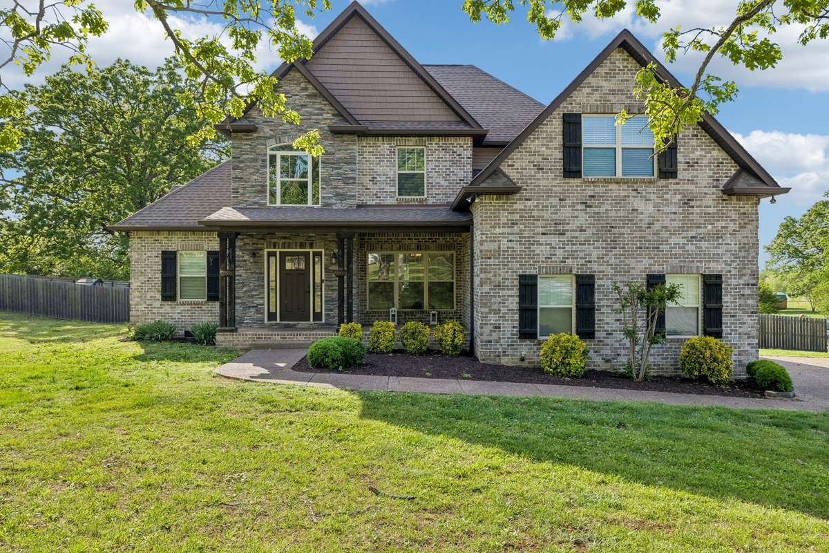 2015 Fleming Home All Brick on 5.2 Acres Fenced In and ready for your Mini Farm.