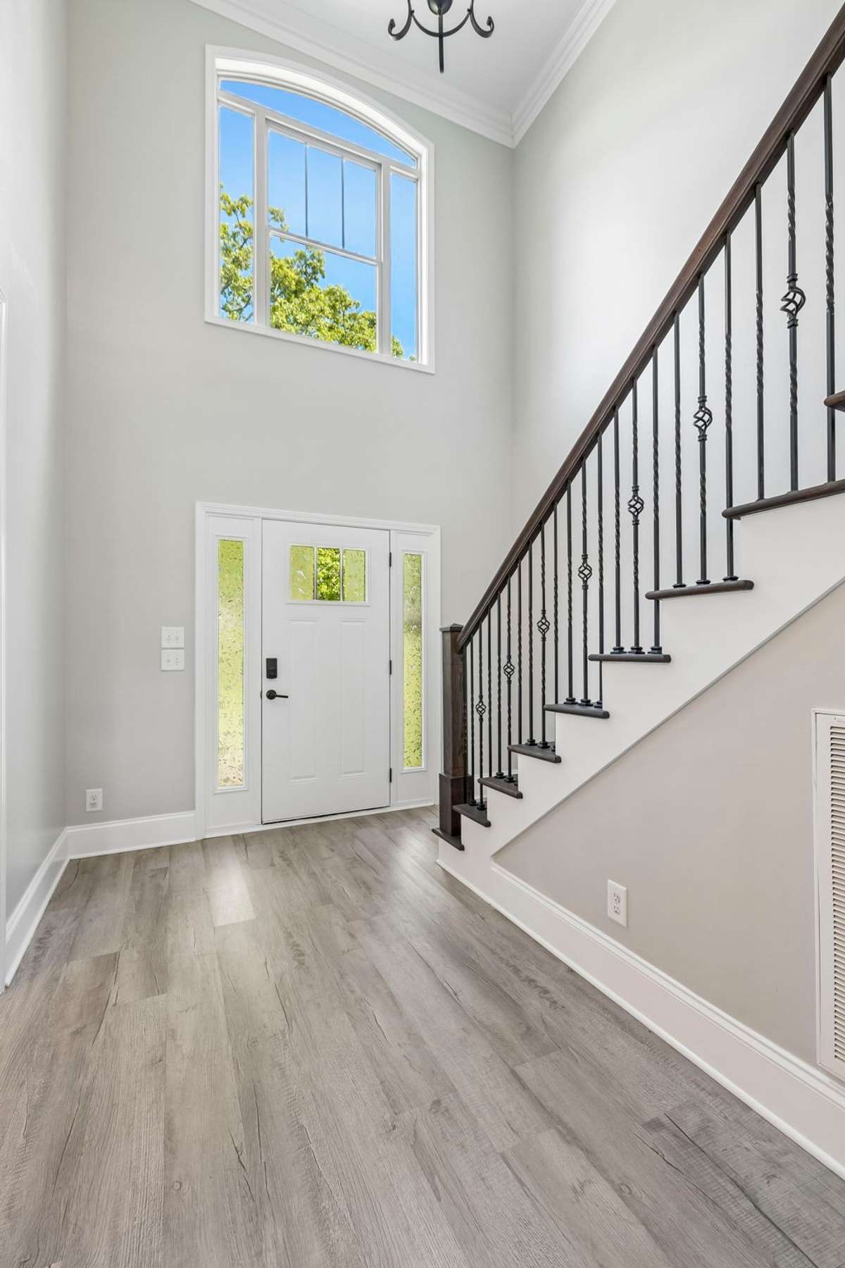 New paint and flooring throughout including new banisters and tread on the stairs!