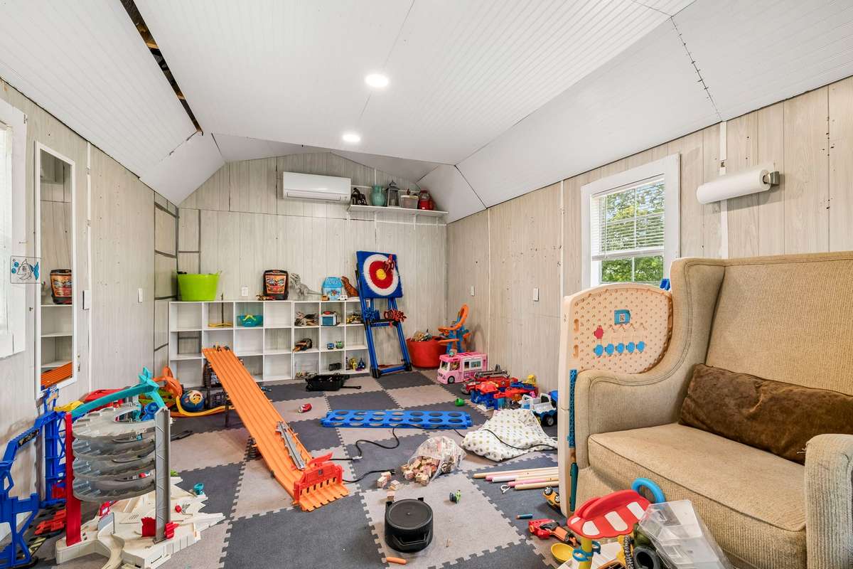 Huge outbuilding with mini-split inside. Perfect for kids or a hobby room!
