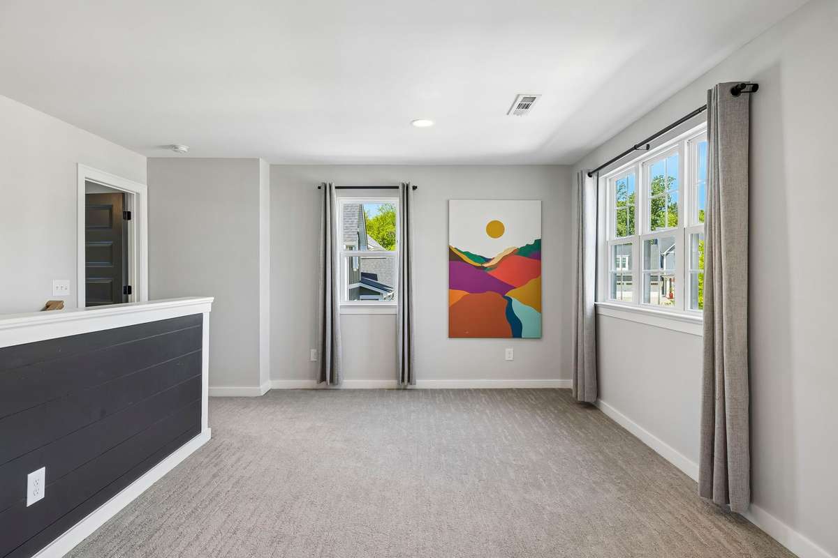 The truly massive bonus area upstairs features extra windows to let in the light