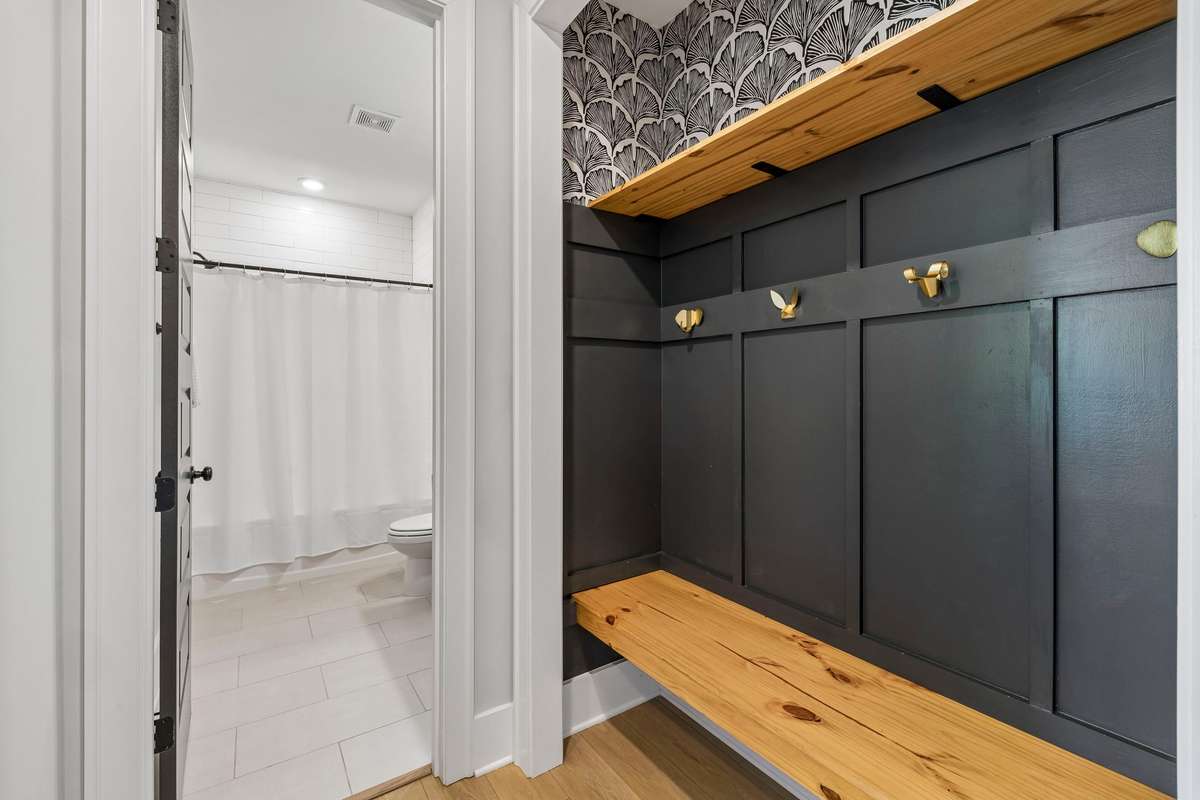 Chic and modern drop zone with custom wallpaper accent