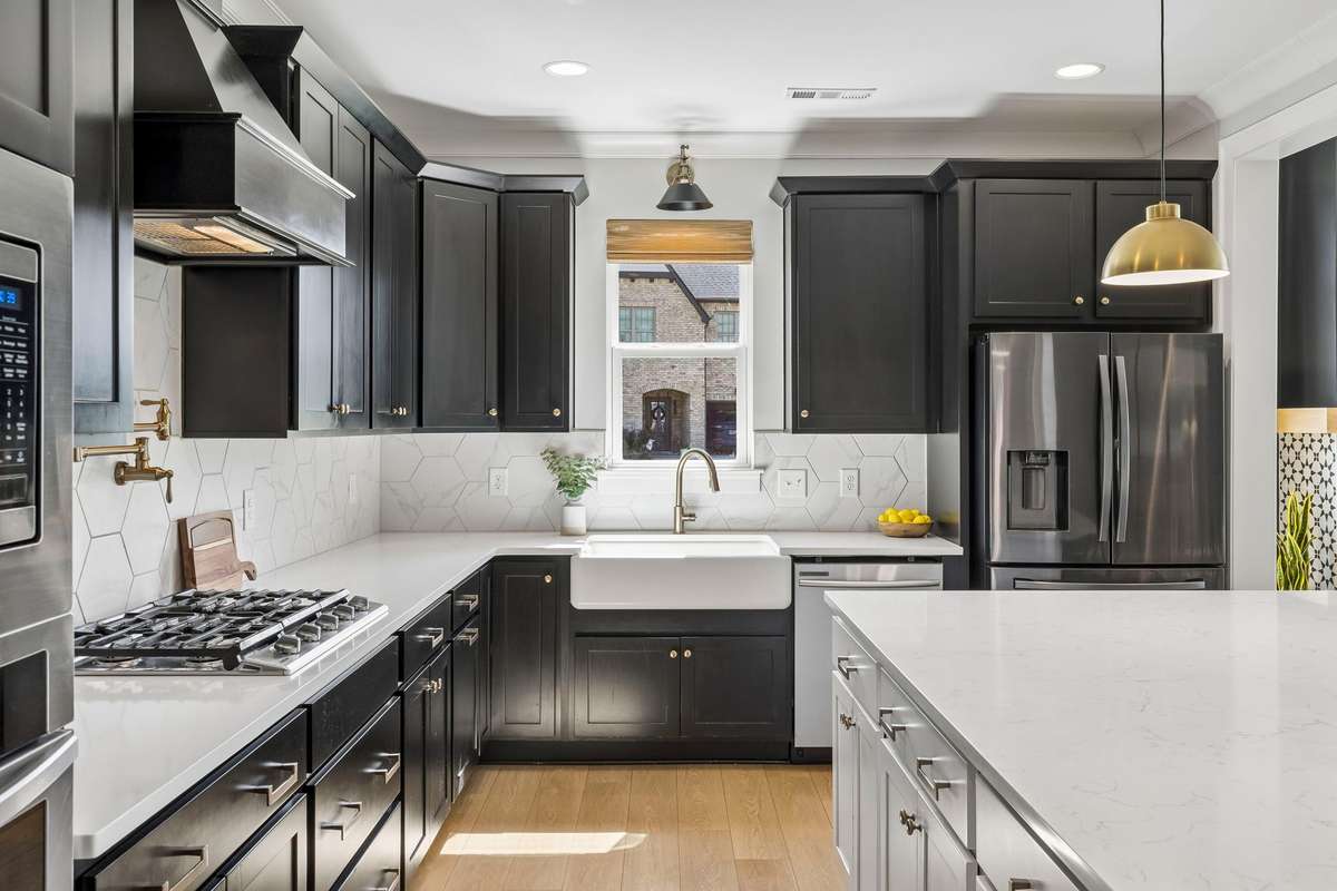 Gas range, pot filler and farmhouse sink are just some of this kitchen's fabulous upgrades