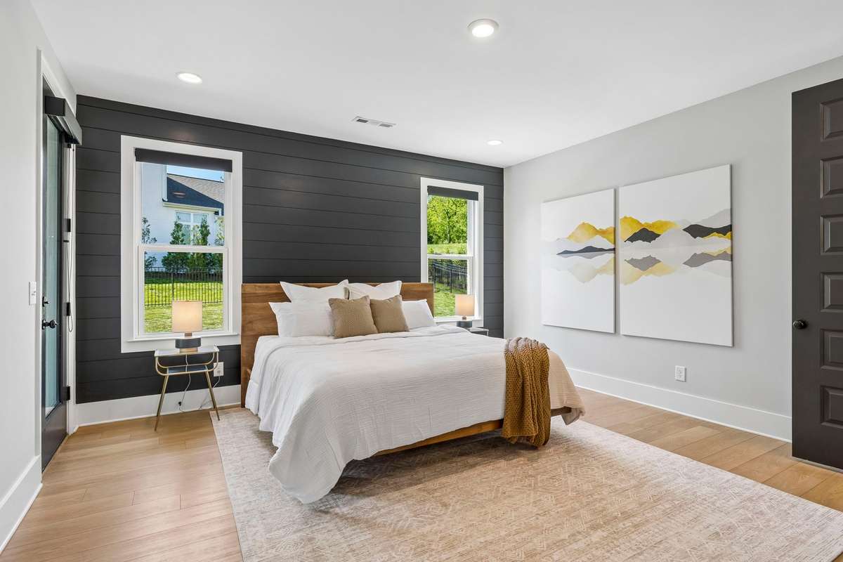 The downstairs primary suite is a true oasis