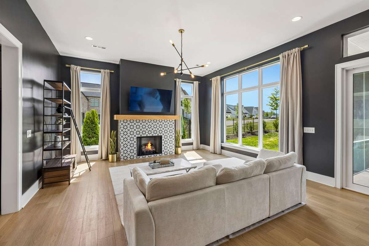 Floor to ceiling windows flood the open layout with light