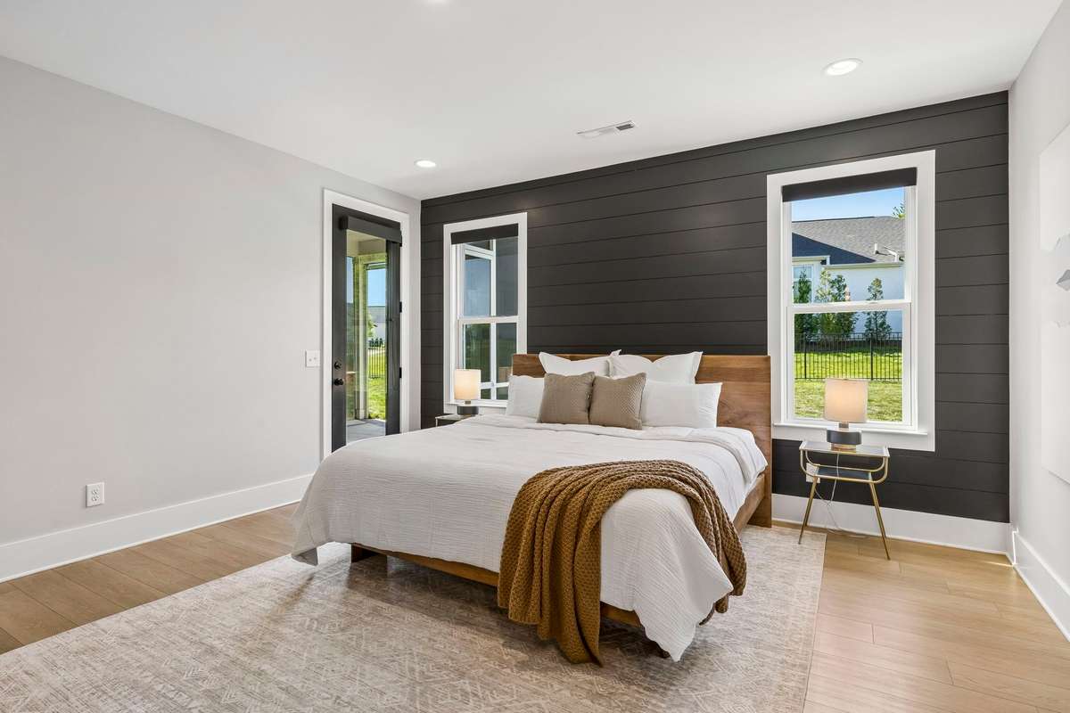 Beautiful black shiplap and custom window shades for privacy