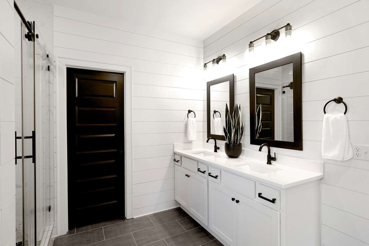 Dual vanities and shiplap throughout