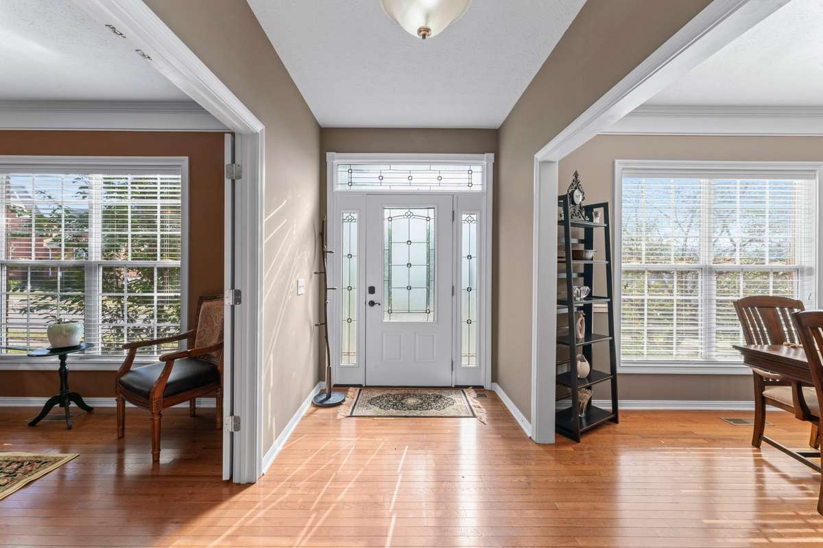 The front elevation has a nice entry door with sidelights. It enters into the office & dining room.