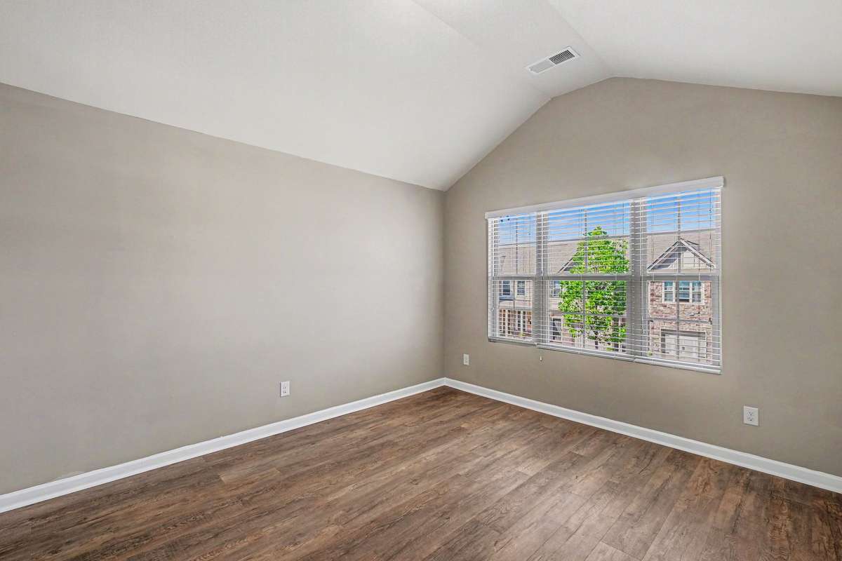 Primary bedroom with arch ceiling