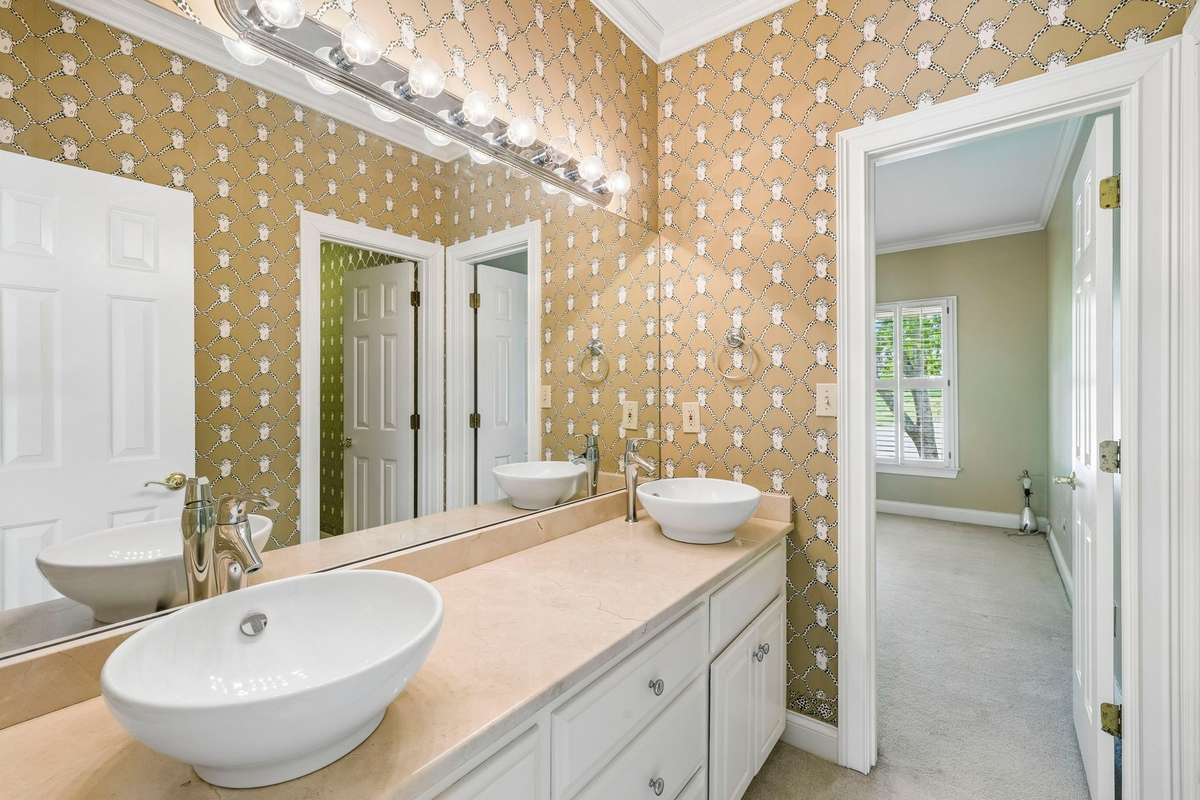 One of the adjoining bathrooms between two of the upstairs bedrooms