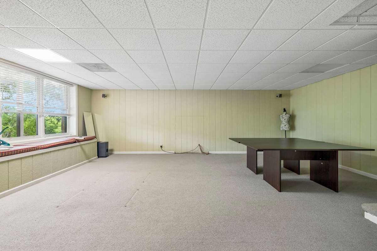 The rec room can be used as a bonus room, workout area, home office, etc.