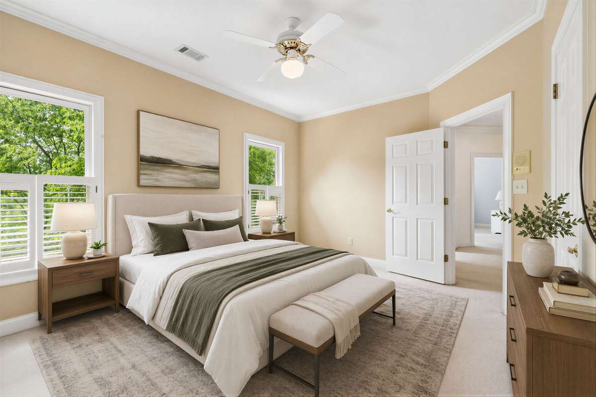This upstairs bedroom photo has been virtually staged.