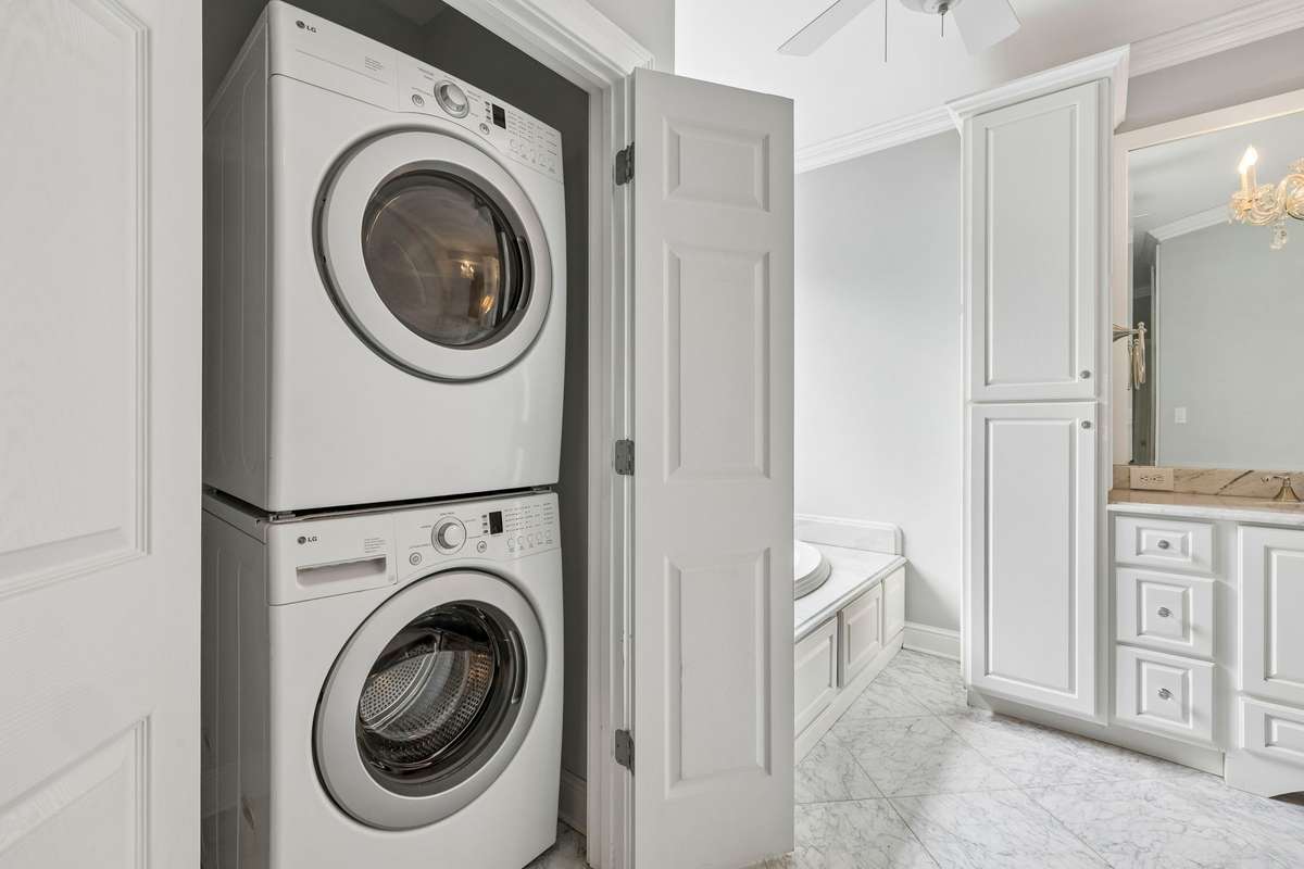Private laundry in the primary bathroom.