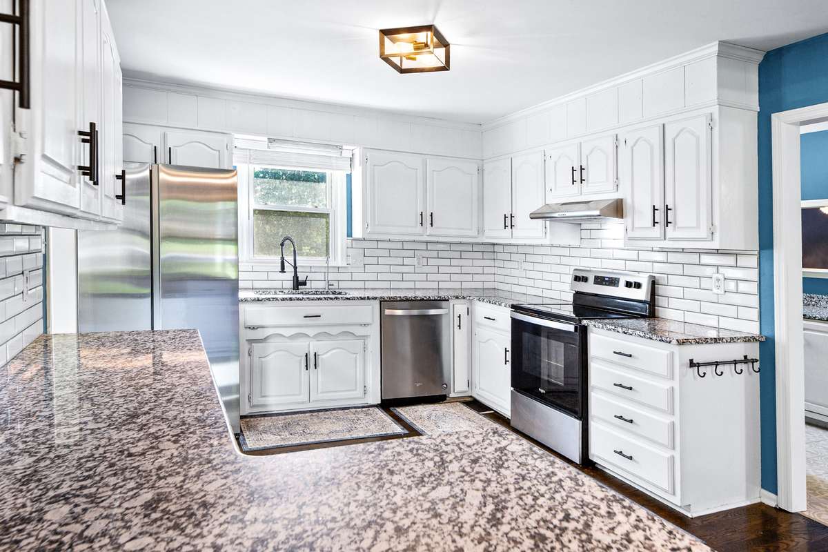 Kitchen with Laundry room through door to the right