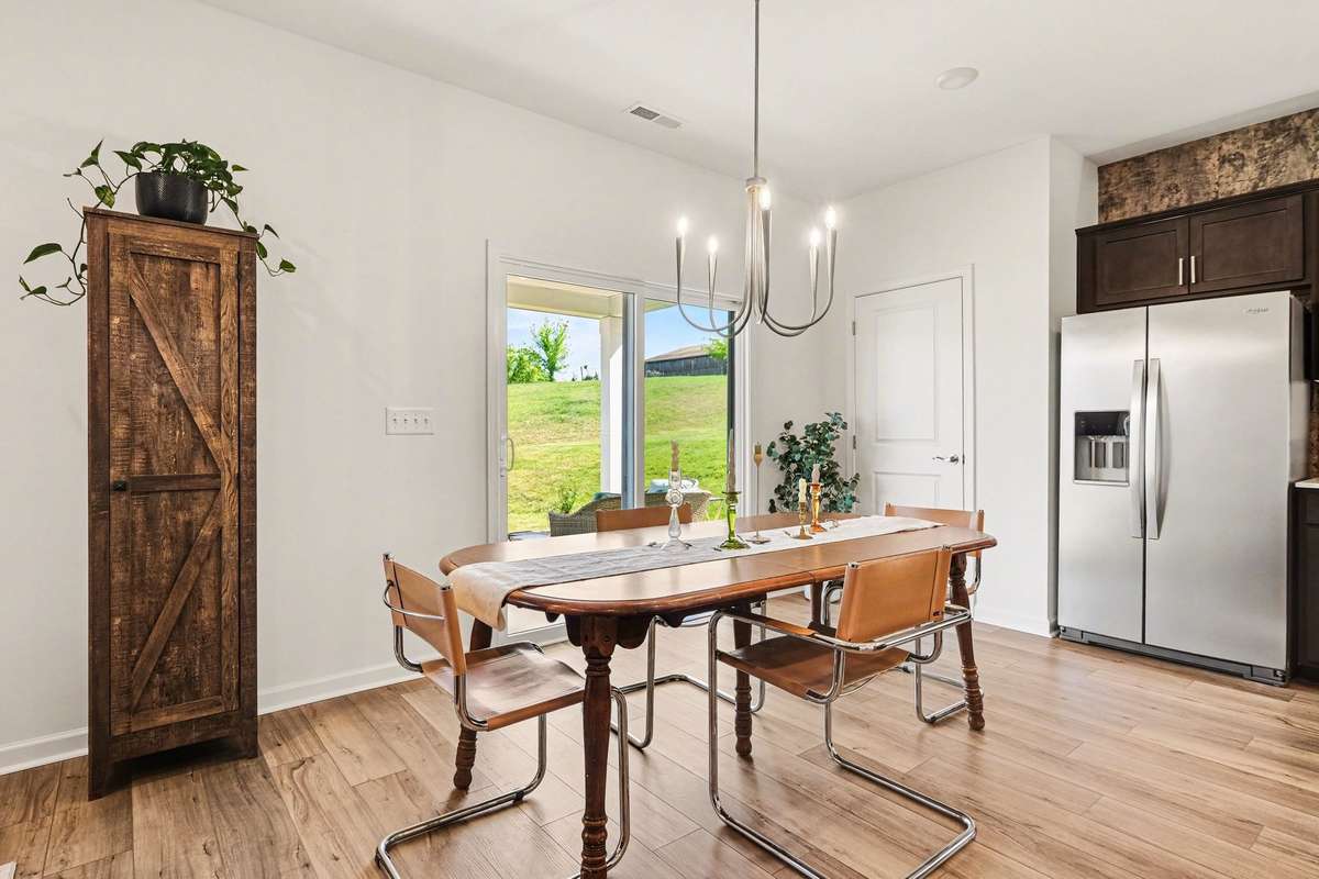 The dining area off the kitchen has plenty of space for a large table seating 6-8