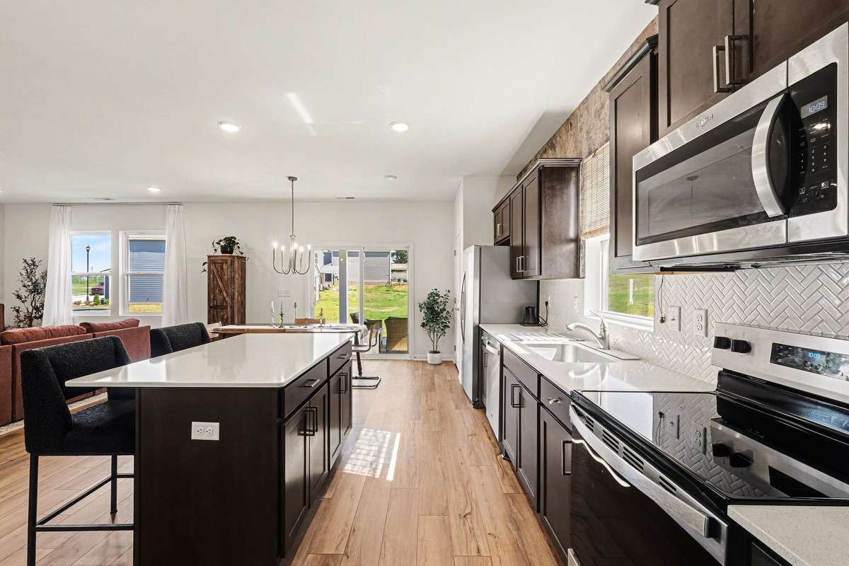 Herring bone white tile backsplash
