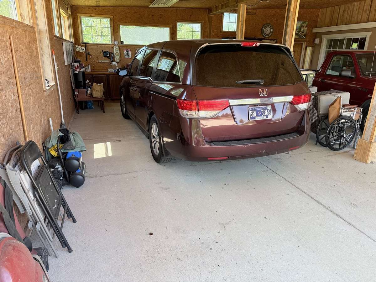 4 car garage this side has 10' opening. Has separate electric panel