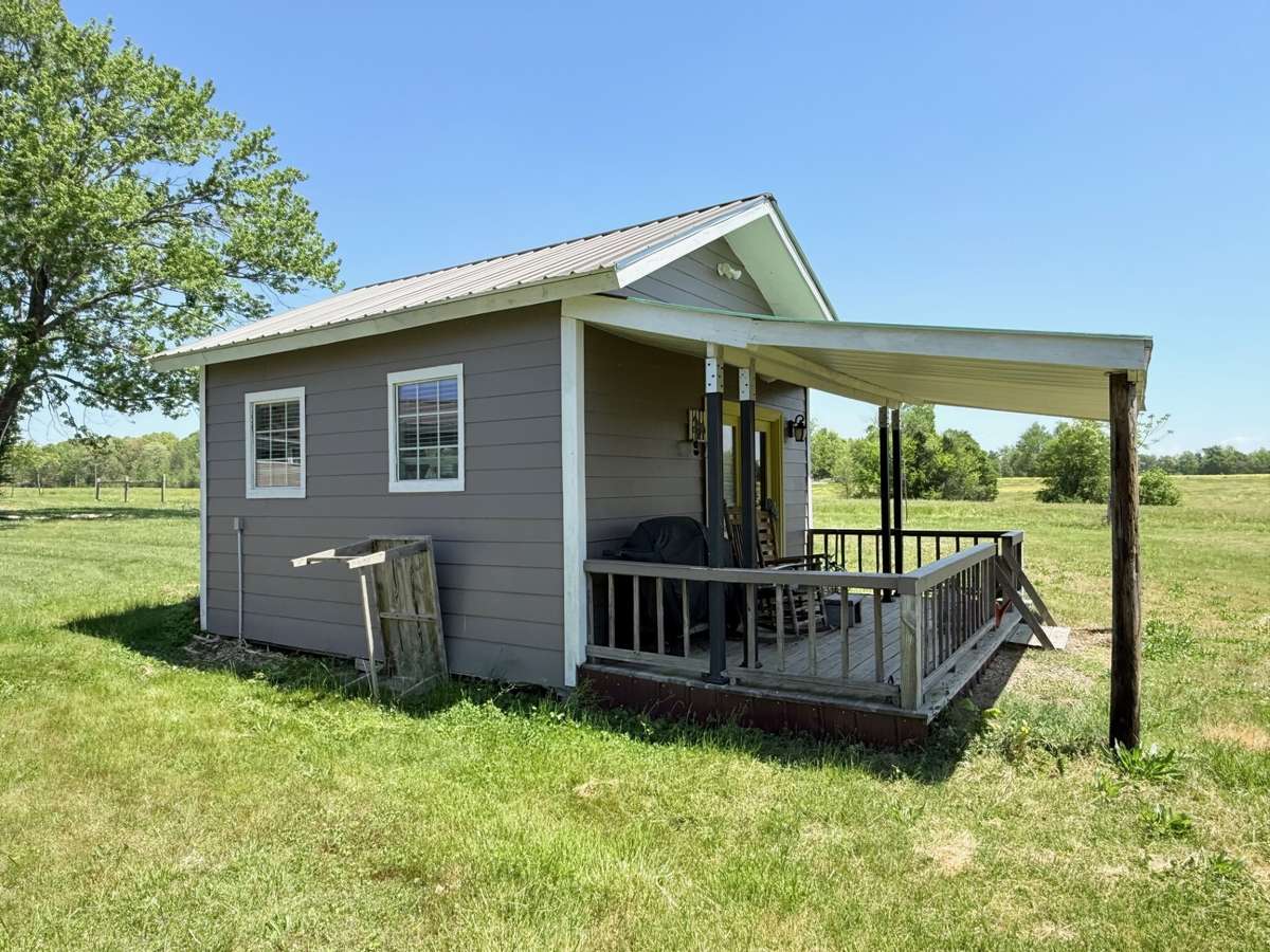 Tiny home has water and bed loft