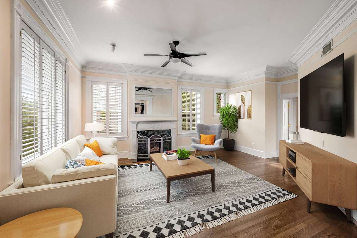 The large living room is full of natural light - much bigger than you would imagine!
