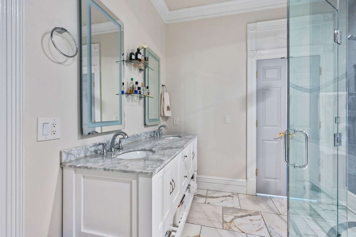 Double vanities - and lots of storage underneath the sinks