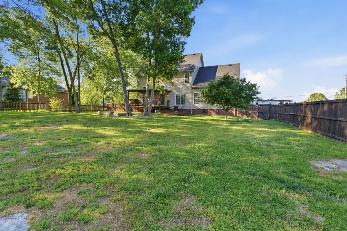 Checkout this oversized, fenced yard with more space than most in the neighborhood!