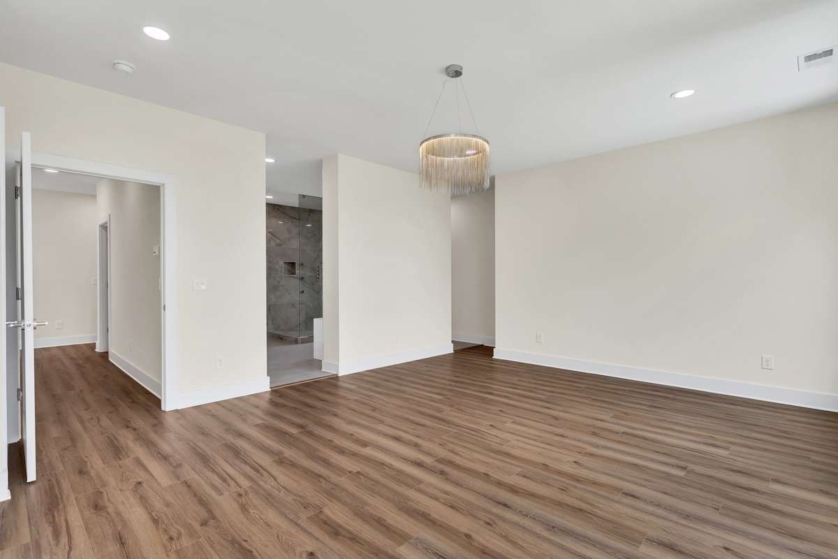 With this large open floor plan in the primary bedroom upstairs you will have a wonderful night sleep.