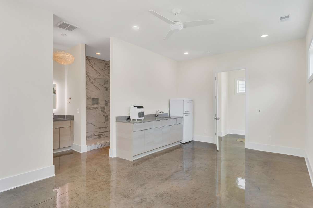 Primary suite downstairs is available to lock out from the rest of the home, so that you may share your space with others for additional income.