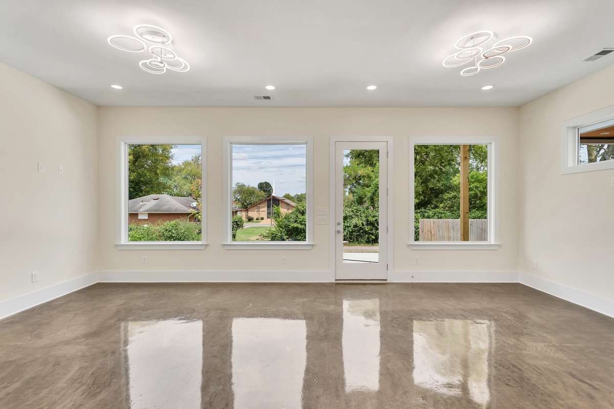 Enjoy the artesian, polished concrete floors throughout downstairs.