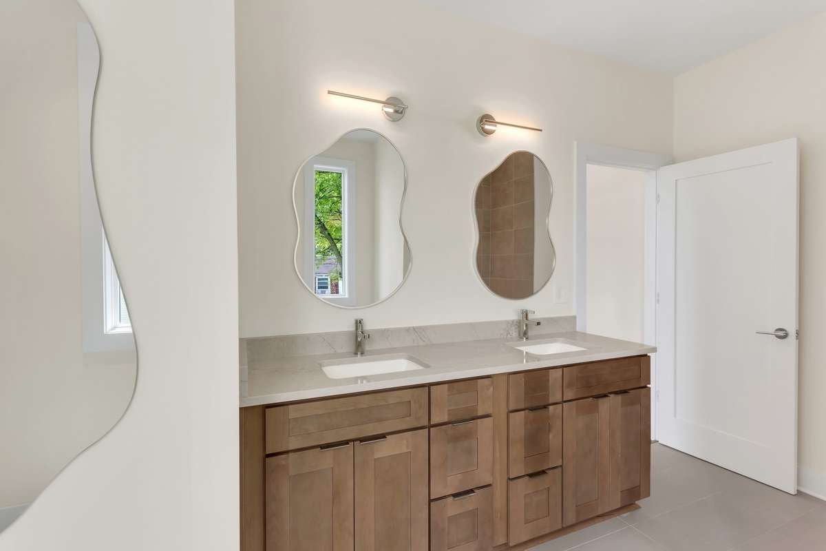 This non-connected Jack and Jill bathroom gives more privacy for the two additional bedrooms upstairs.