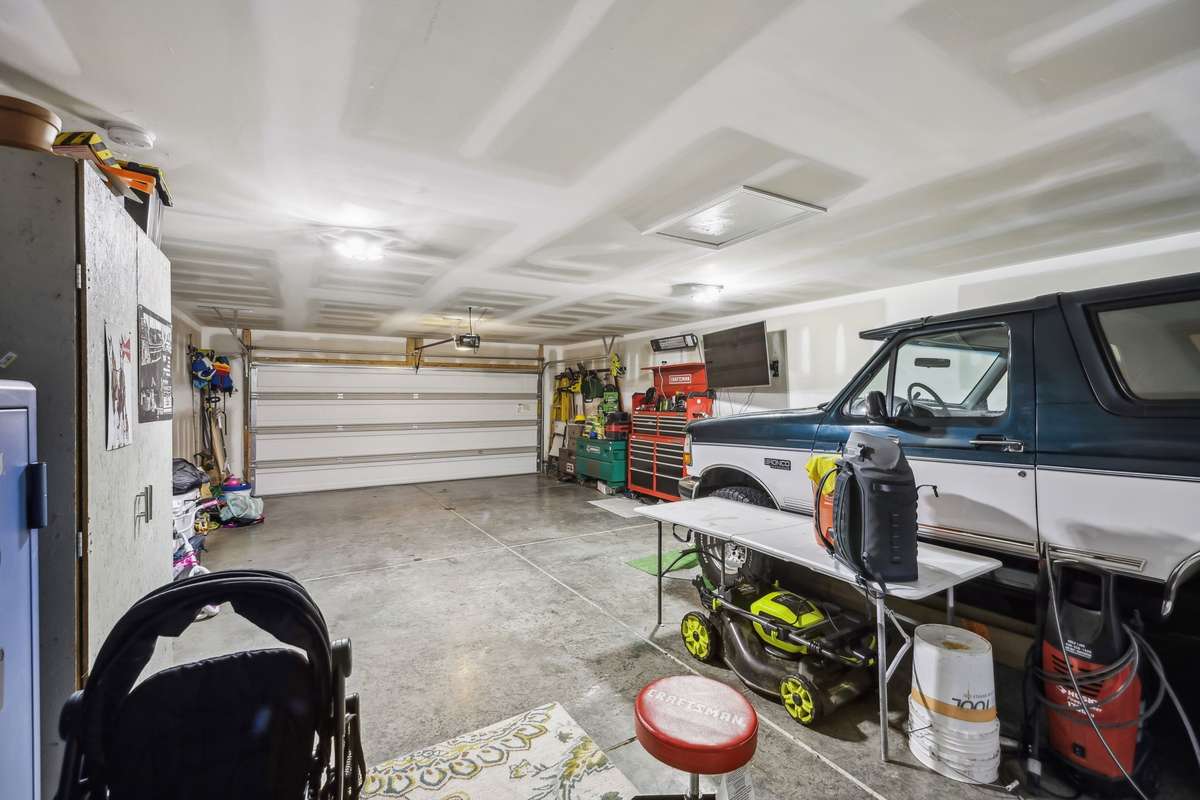 huge double depth garage with space for four vehicles or toys and a workshop!