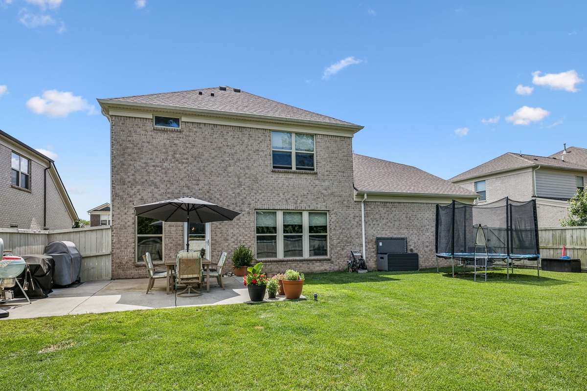 fully fenced backyard on level lot