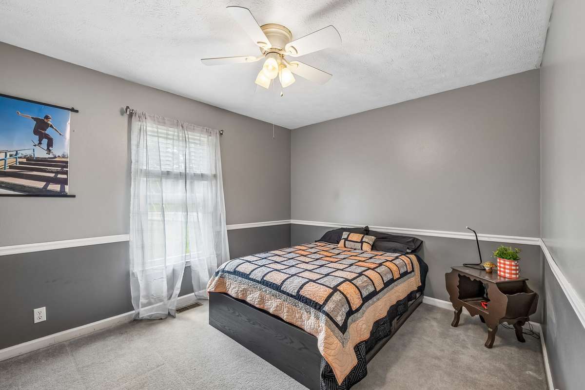 Good-sized secondary bedroom downstairs with a generous closet.