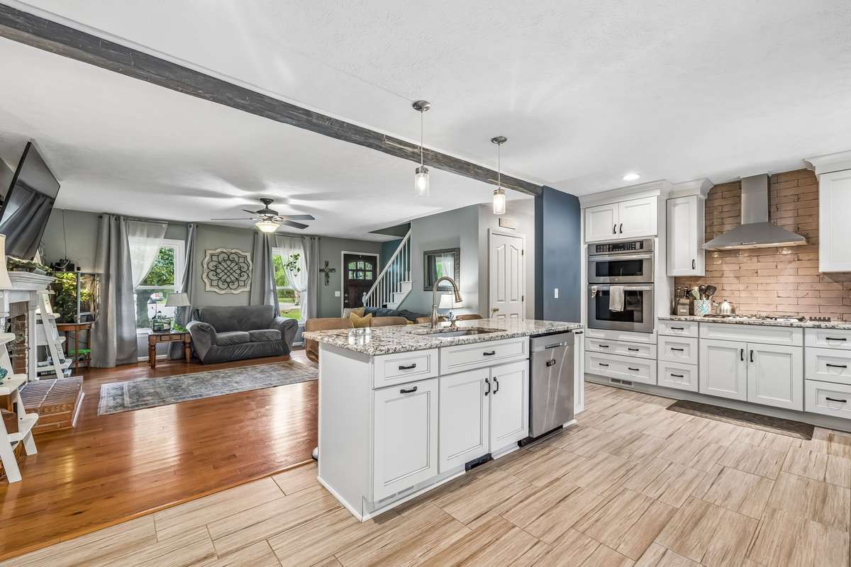 Open floor plan flows from kitchen island straight into the living area.