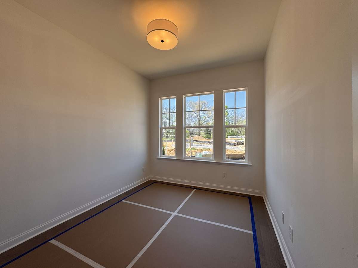 Primary and Guest Suites are located on the main level with access to a full bath.